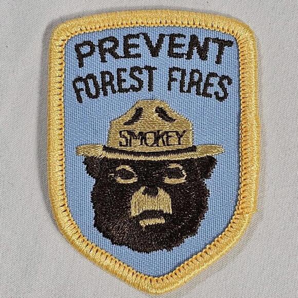 Vintage Smokey Bear Embroidered Iron On Patch Blue Yellow Prevent Forest Fires - Picture 1 of 4
